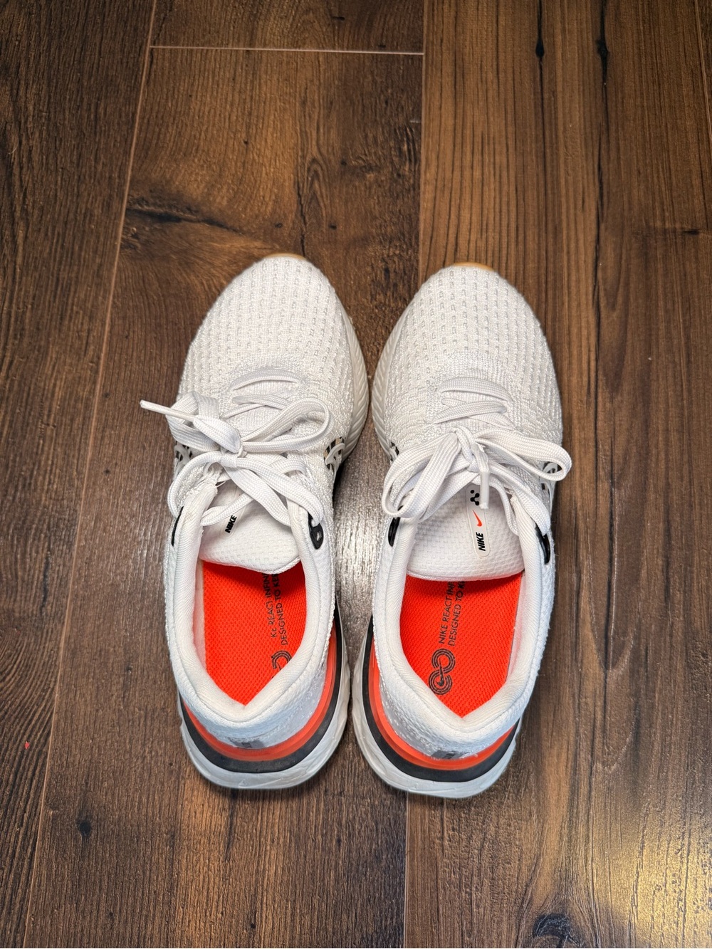 **NWOT** Nike White Flyknit Running Shoes with Black and Orange Accents - Picture 4 of 5